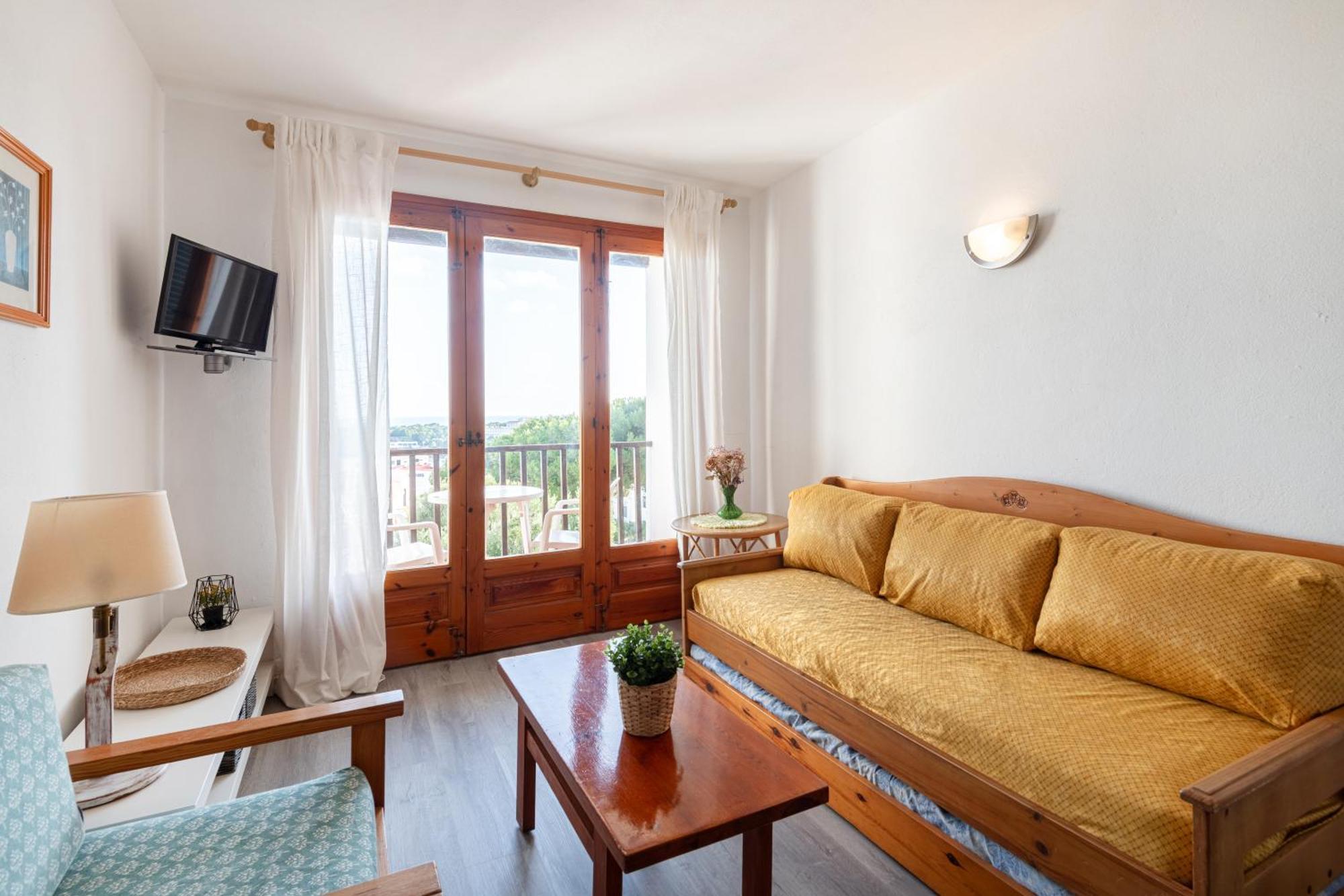 Апартаменты Menorca Sol Isla Ареналь-д'эн-Кастель Экстерьер фото